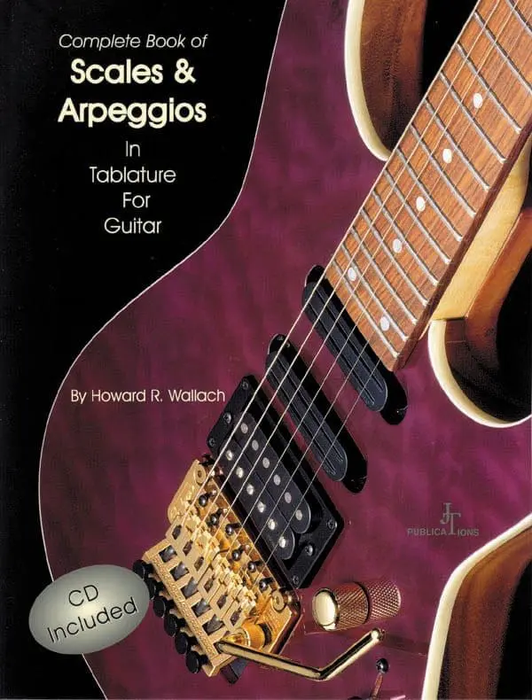 A book cover with an electric guitar and a ball point pen.