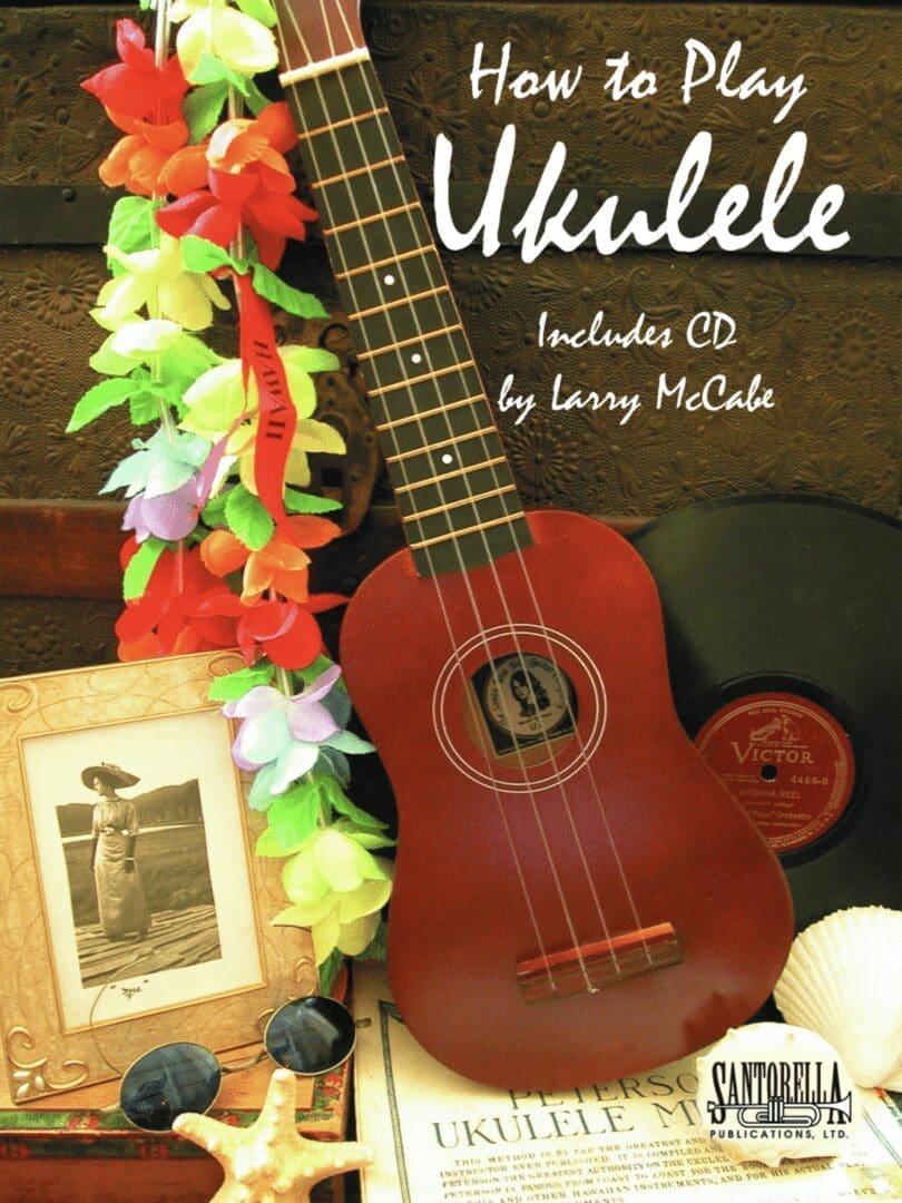 A ukulele book with an old photo and some flowers