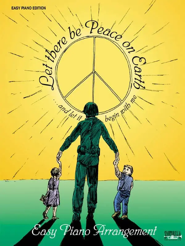 A man holding two children 's hands in front of a peace sign.