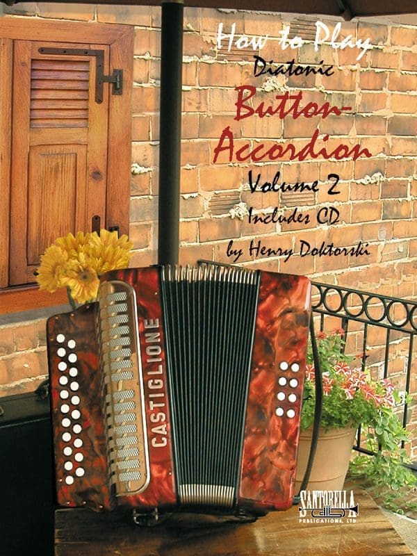 A book cover with an accordion on the front of it.