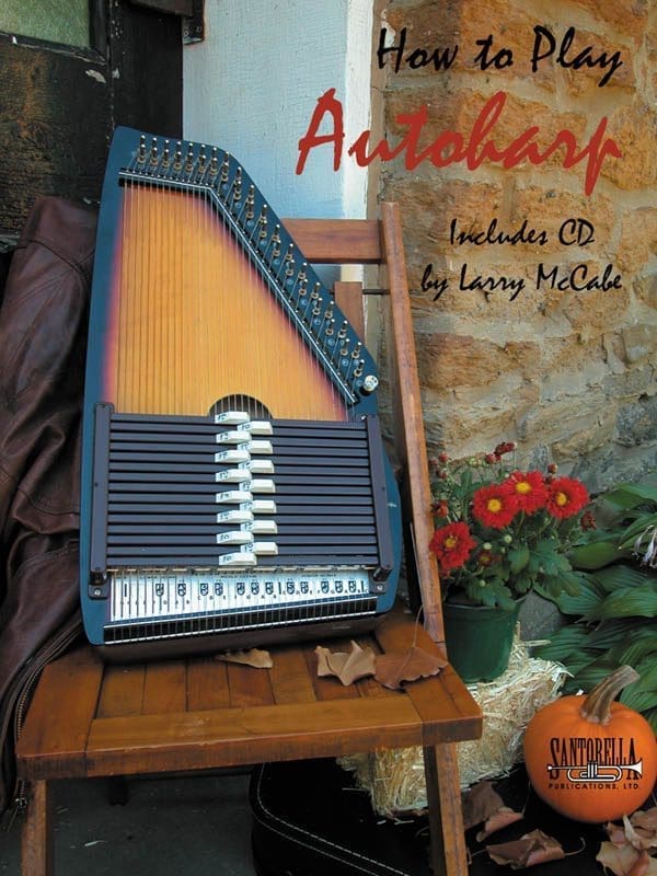 A book cover with an instrument sitting on top of a table.