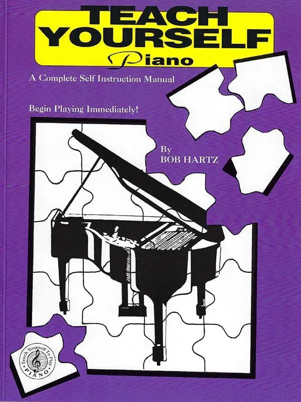 A purple book cover with a black and white piano.