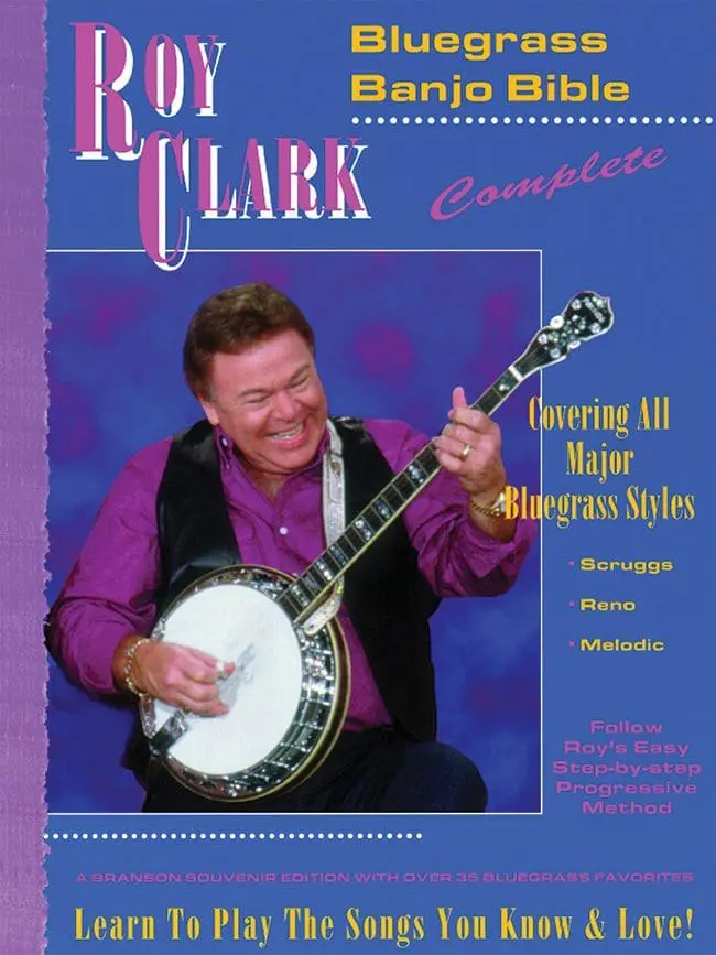A man with a banjo in front of a purple background.